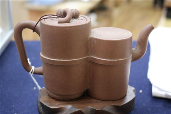 A Yixing double teapot, with wood stand